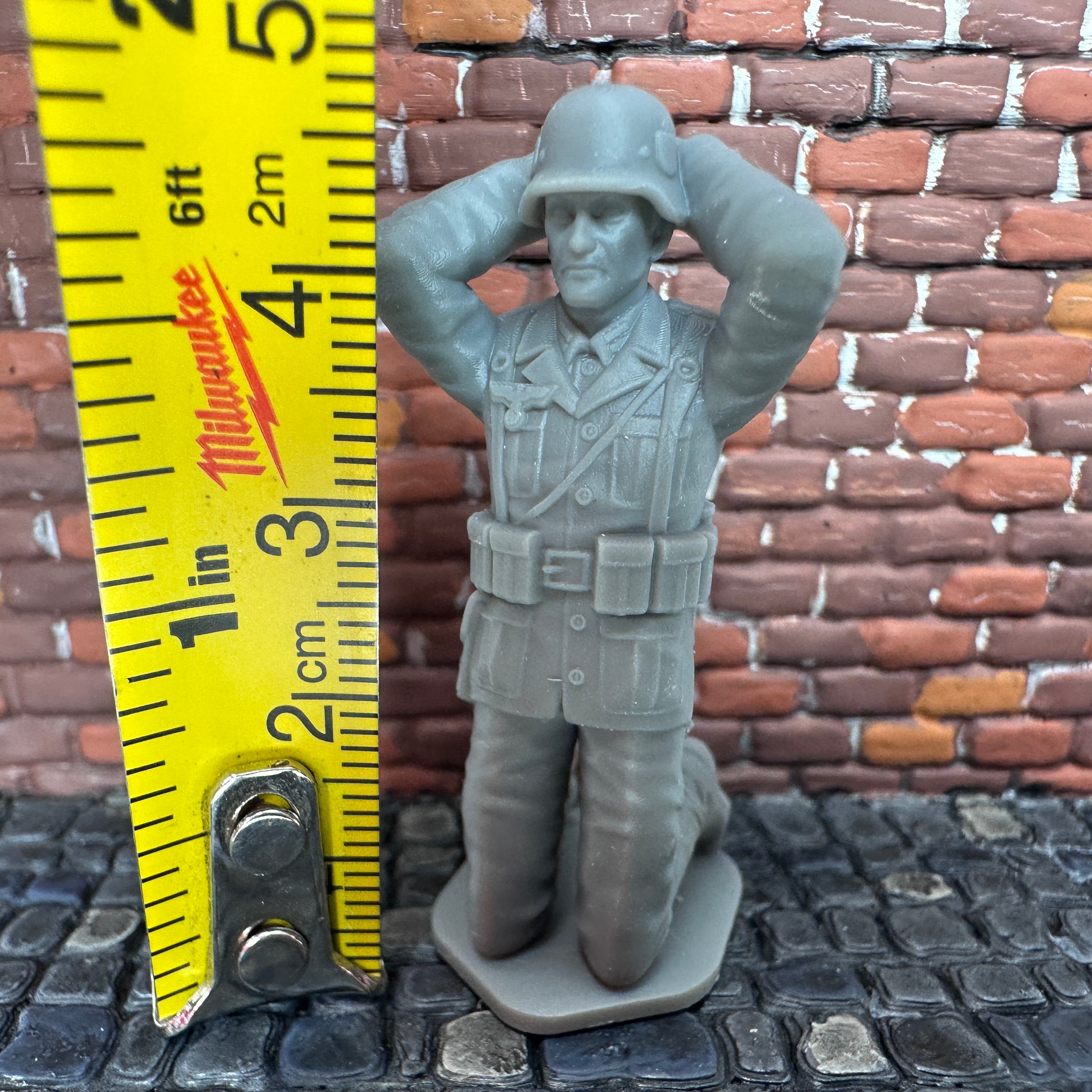 WW2 German Soldier Kneeling Surrendering